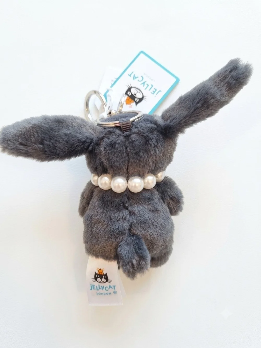 Jellycat Charcoal Bunny Bag Charm with Pearl Necklace